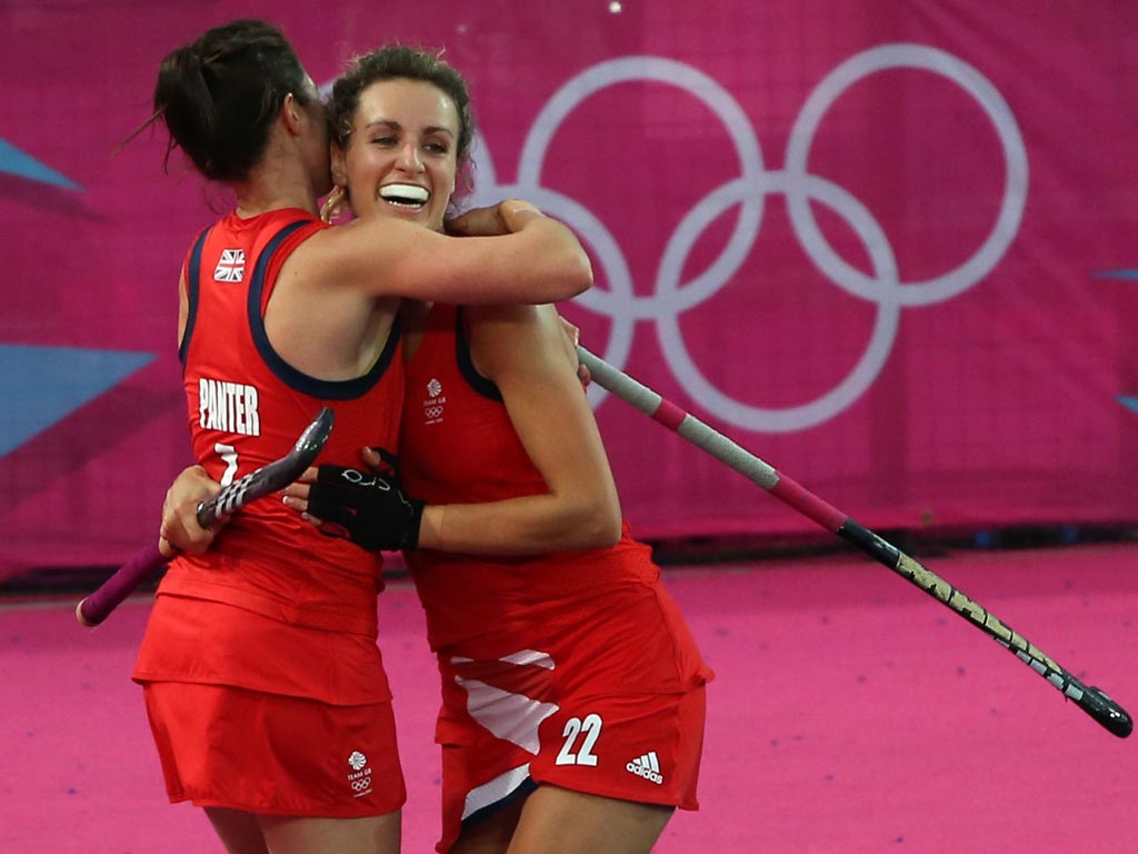 Ashleigh Ball of Great Britain and team mate Anne Panter celebrate scoring a goal