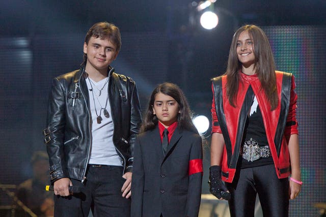 From left, Prince Jackson, Prince Michael II "Blanket" Jackson and Paris Jackson arrive on stage at the Michael Forever the Tribute Concert, at the Millennium Stadium last year