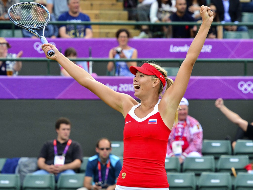 Friday 3 August: Maria Sharapova celebrates after her win against Maria Kirilenko in the women's singles semi-finals at Wimbledon