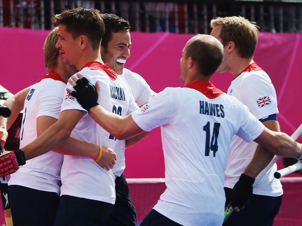 Friday 3, August: James Tindall of Great Britain celebrates with team mates after his goal during the Men's Hockey match between Great Britain and Pakistan