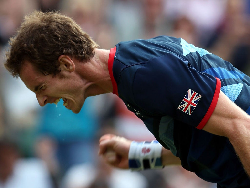 Andy Murray enjoys his moment of victory last night