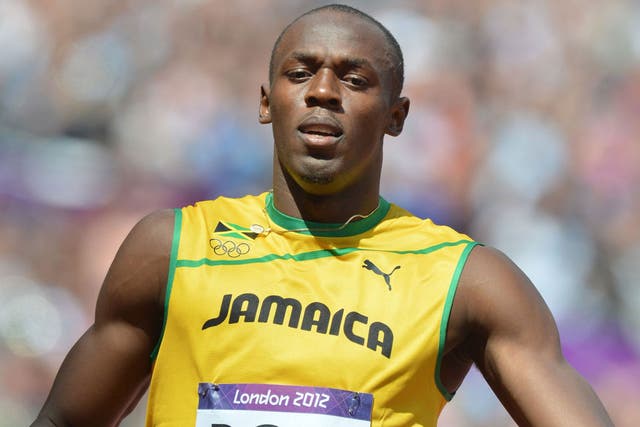 Usain Bolt wins his 100m heat in 10.08 seconds