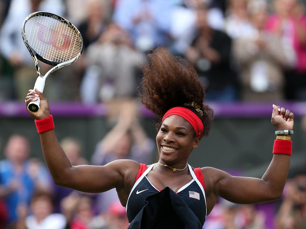 August 4, 2012: Serena Williams celebrates winning gold after defeating Russian Maria Sharapova at Wimbledon