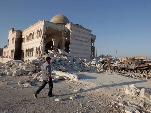 Dust to dust: The mosque at Azaz, north of Aleppo, last week