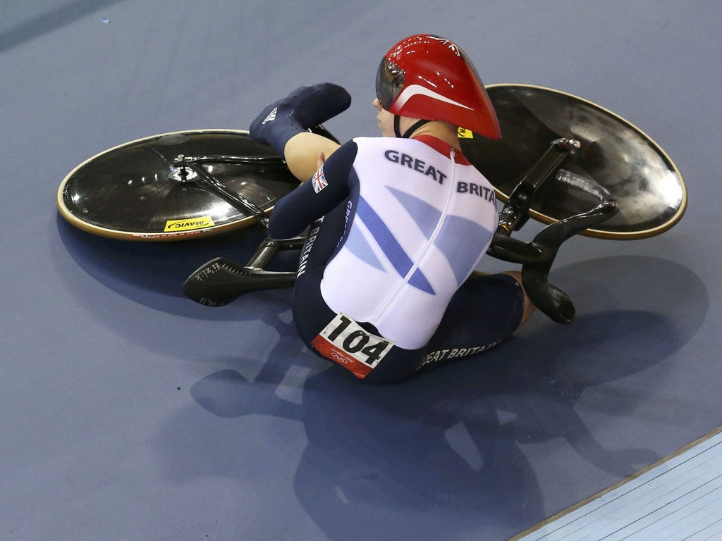 Down, not out: Philip Hindes falls off and prompts a restart in the team sprint on Thursday