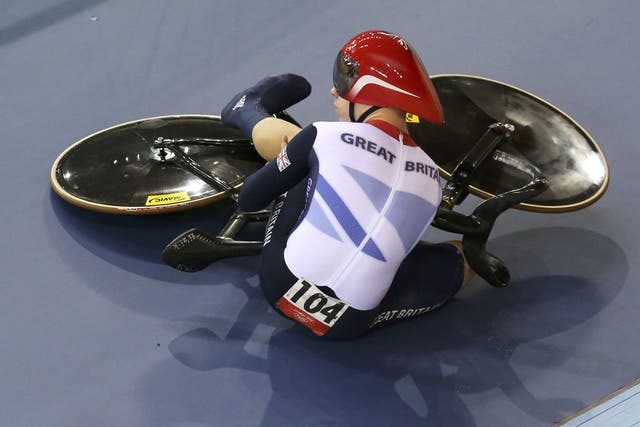 Down, not out: Philip Hindes falls off and prompts a restart in the team sprint on Thursday