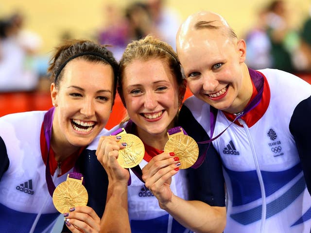 August 4, 2012:  Dani King, Laura Trott, and Joanna Rowsell of Great Britain pose with their gold medals during the medal ceremony for the Women's Team Pursuit