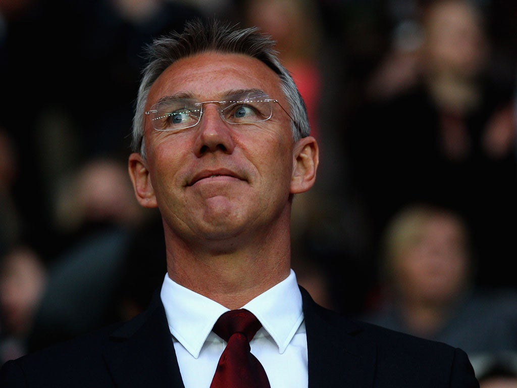 Lean times: 'There is a stability here that should give us strength,' says Nigel Adkins of the Premier League challenge
