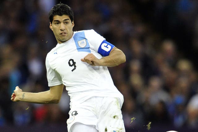 Brendan Rodgers, has urged the striker Luis Suarez (pictured) to put his troubles of last season behind him