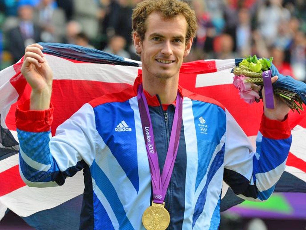 Andy Murray celebrates becoming the first Briton to win a tennis
gold medal for 112 year