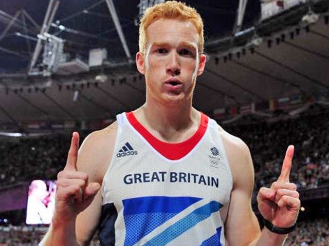 Greg Rutherford of Great Britain celebrates winning gold in the Men's Long Jump Final