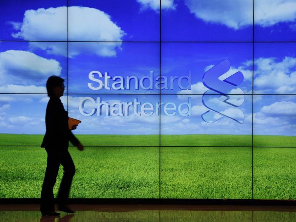 Clouds still in Standard Chartered's sky despite improving results