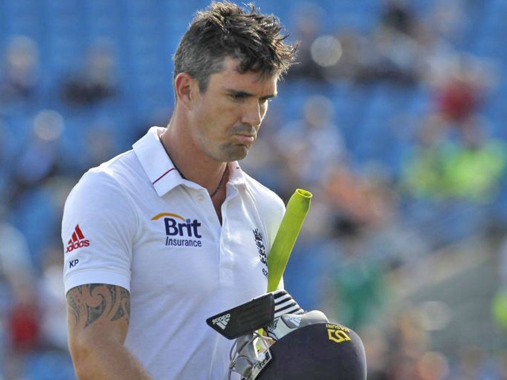Kevin Pietersen trudges off after holing out yesterday