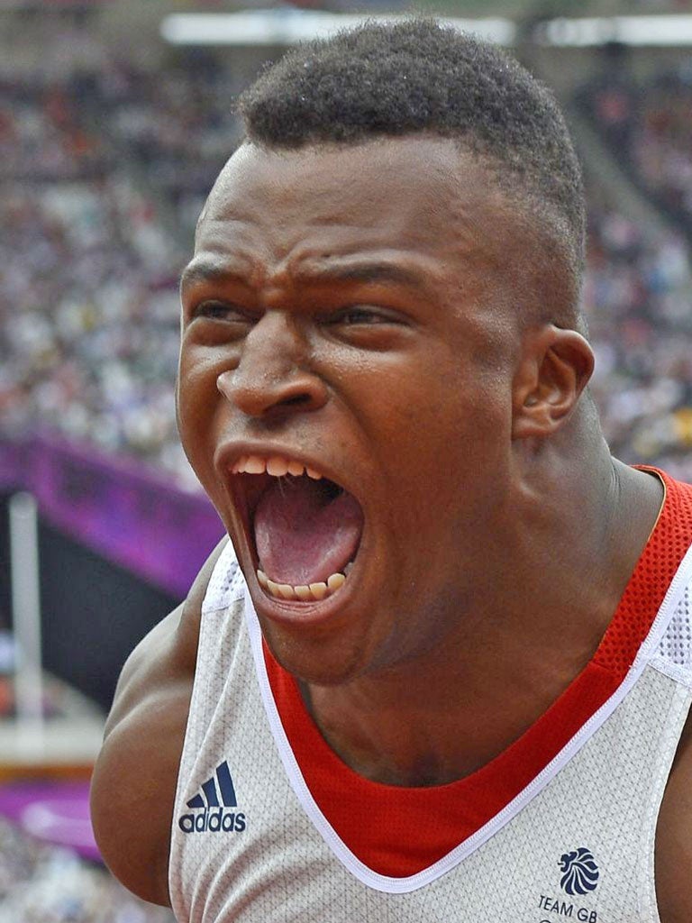 Lawrence Okoye lets the Olympic Stadium in on how happy he is to go through