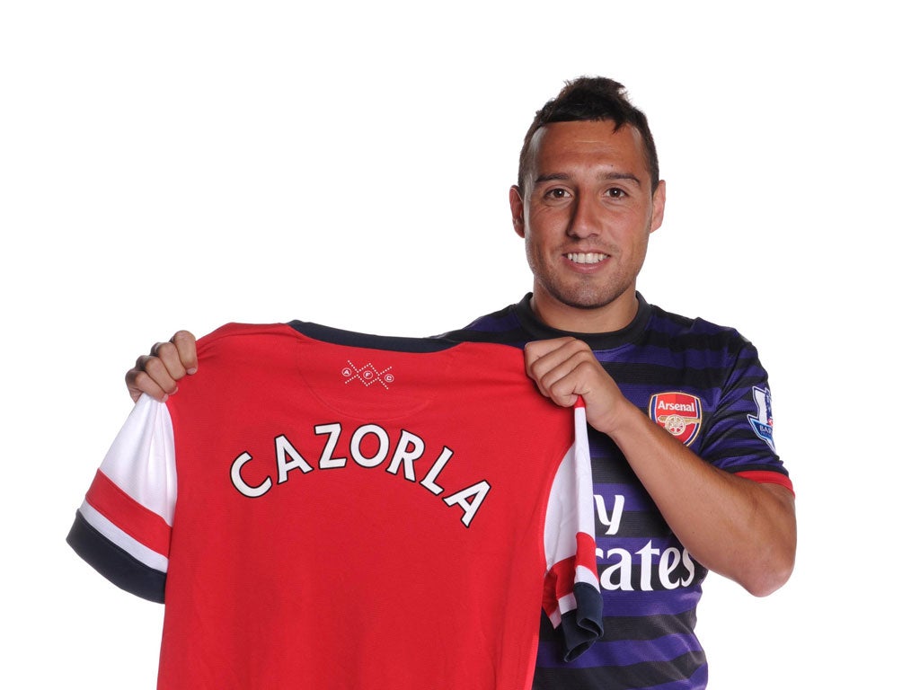 Santi Cazorla signs on a long-term contract from Malaga