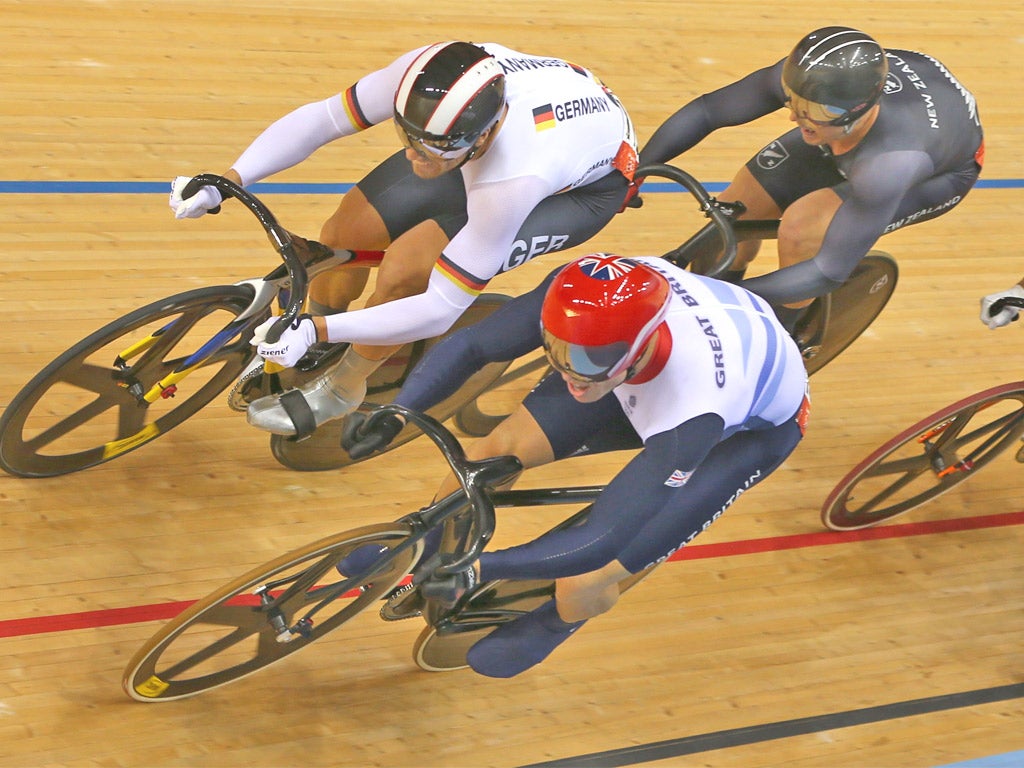 Sir Chris Hoy charges to the front en route to claiming his sixth Olympic gold