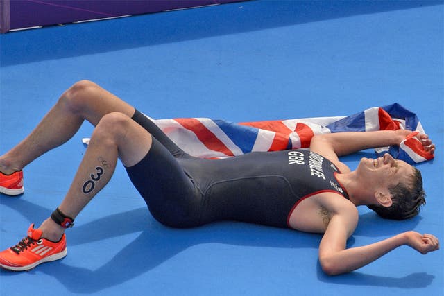 An exhausted Alistair Brownlee following his victory