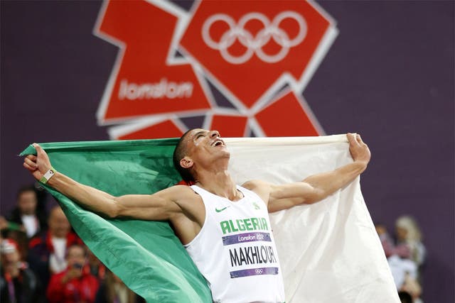 Algeria’s Taoufik Makhloufi starts celebrates 1500m victory