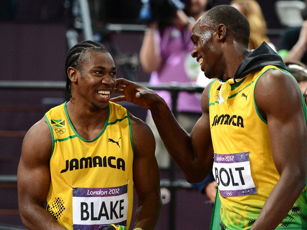 Yohan Blake (left) says he is unfazed by Usain Bolt