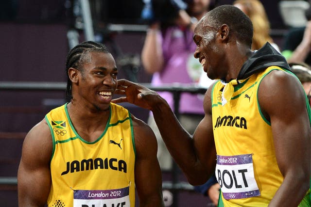 Yohan Blake (left) says he is unfazed by Usain Bolt