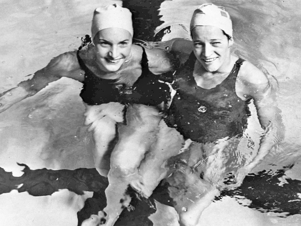 Curtis, left, with Karen Harup after one of the 1948 Olympic finals