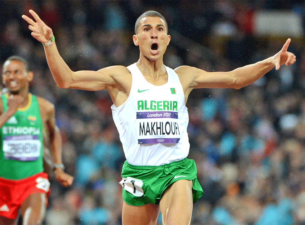 Algeria’s Taoufik Makhloufi celebrates winning the 1500m final
