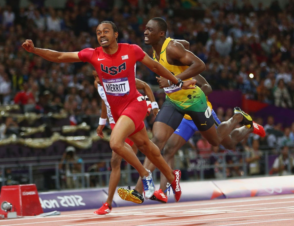August 8, 2012: Aries Merritt of the United States crosses the finish line ahead of Hansle Parchment of Jamaica to win gold in the Men's 110m Hurdles Final