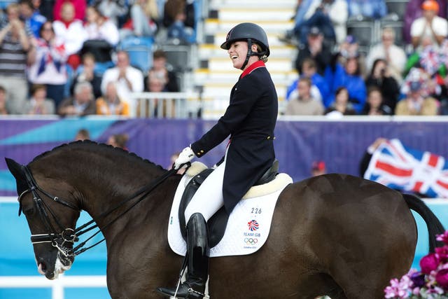 Charlotte Dujardin on Valegro celebrates after competing in the team Dressage