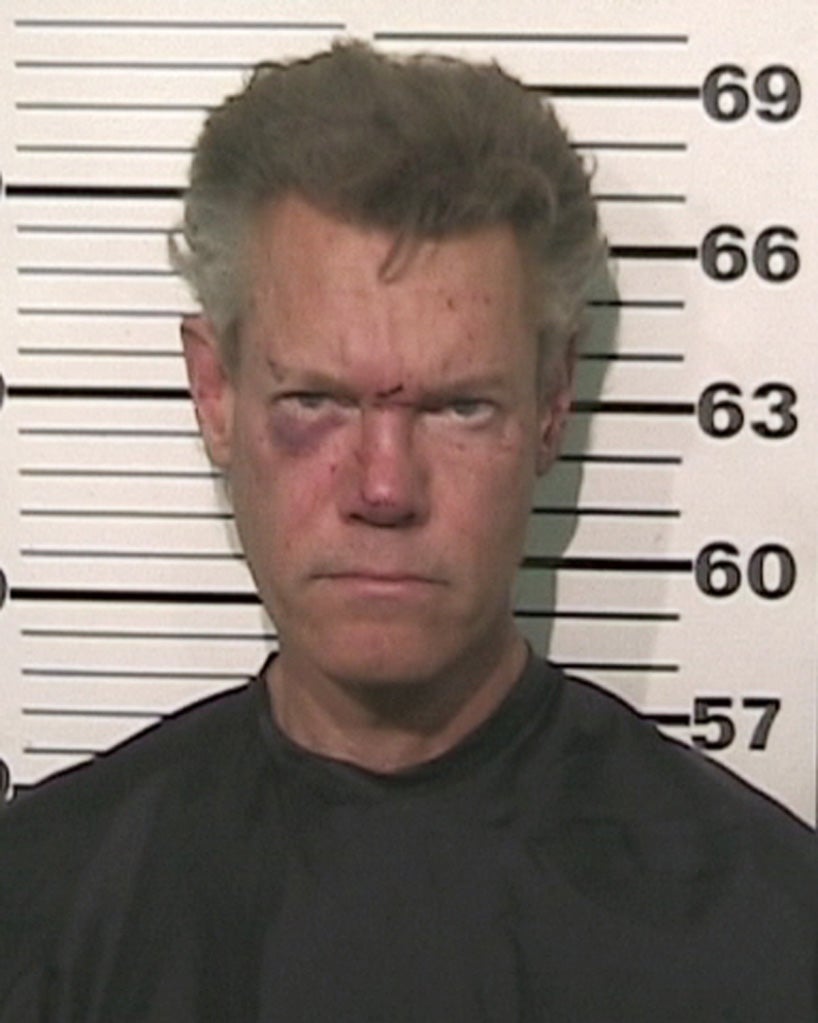 This photo provided by the Grayson County, Texas, Sheriff's Office shows Country singer Randy Travis who has been charged with driving while intoxicated.