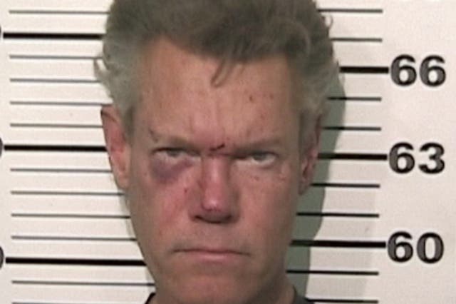 This photo provided by the Grayson County, Texas, Sheriff's Office shows Country singer Randy Travis who has been charged with driving while intoxicated. 
