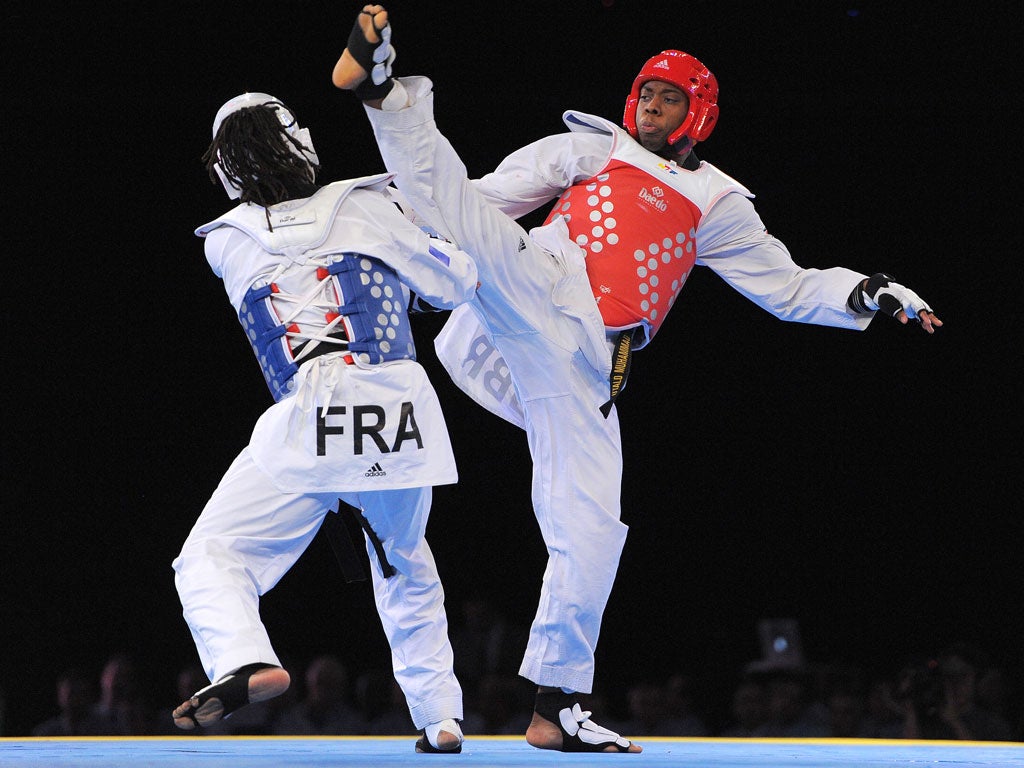 Lutalo Muhammad (in red) competing in the European Taekwondo Championships