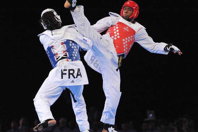 Lutalo Muhammad (in red) competing in the European Taekwondo Championships