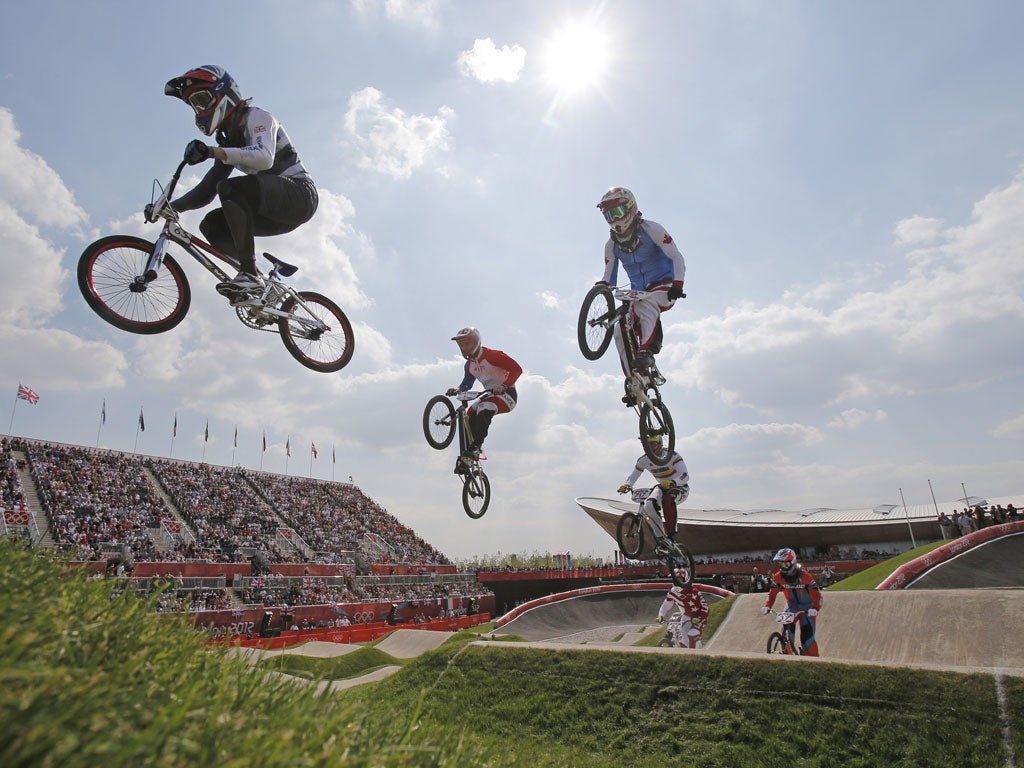 Great Britain's Liam Phillips (left) leaps into the semi-finals yesterday
