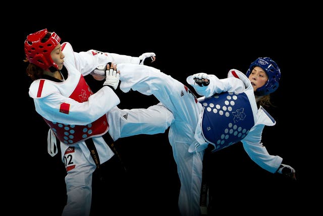 August 9, 2012: Jade Jones (in blue) won Britain's first ever taekwondo gold when she beat Yuzhuo Hou of China in the women's under-57kgs final at ExCeL