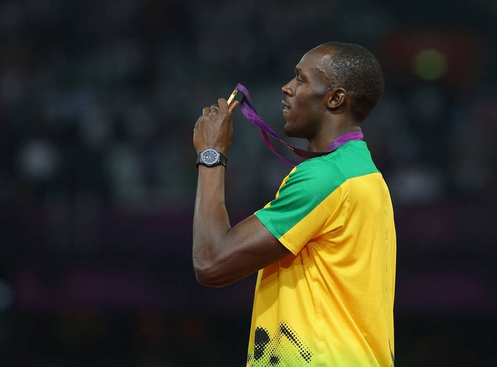 Usain Bolt with his 200 metres gold medal