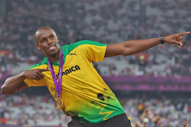 Usain Bolt says he is a 'living legend' after his record-breaking wins yesterday