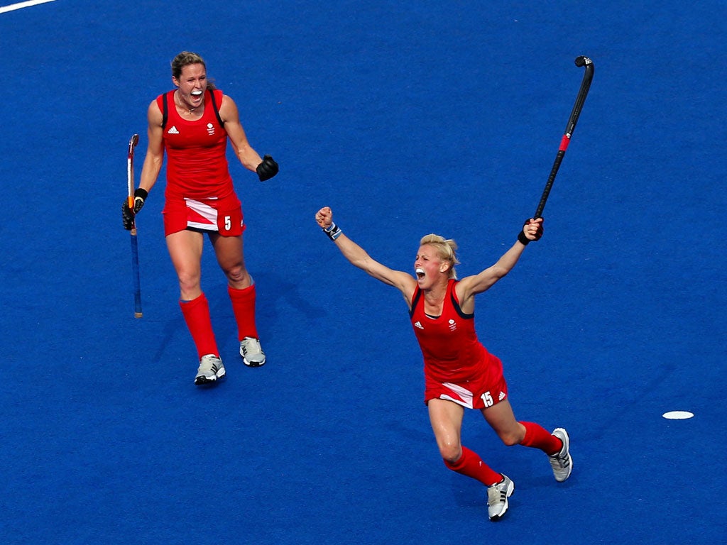 Alex Danson #15 and Crista Cullen #5 of Great Britain react during the first half against New Zealand during the Women's Hockey bronze medal match