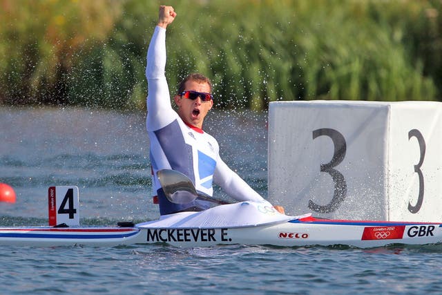 Ed McKeever celebrates after storming to gold in the 200m kayak sprint at Eton Dorney