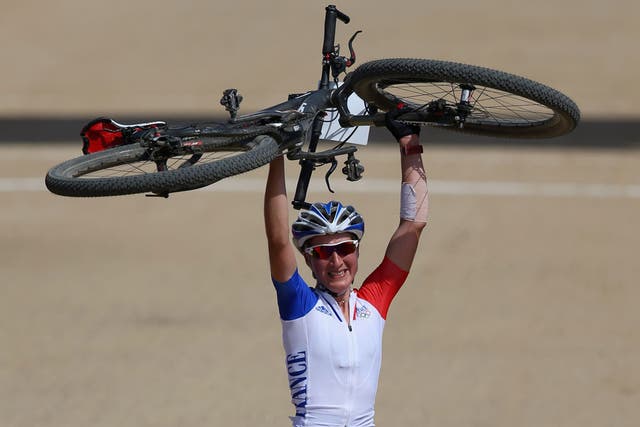 France's Julie Bresset won gold in the mountain biking