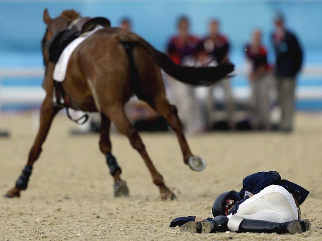 Korea's Woojin Hwang, was thrown off by his horse Shearwater Oscar - the horse bucked after the starting bell sounded