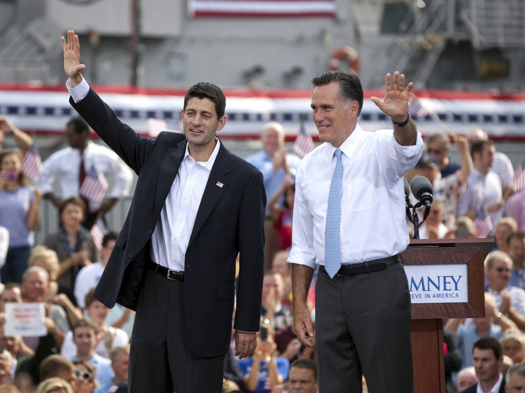 Presidential? Mitt Romney, right, introduces his running mate, Paul Ryan, yesterday