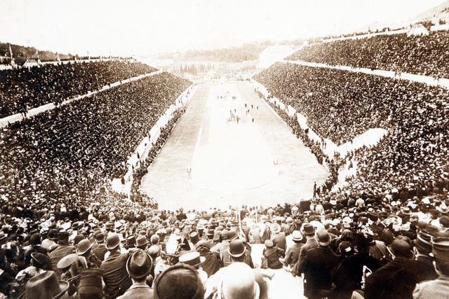 Long wait: The crowd packing the Olympic Stadium at Athens in 1896 eagerly anticipate a home marathon win 
