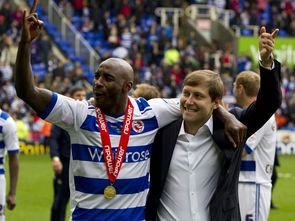 Royal salute: Anton Zingarevich (right) celebrates Reading's Championship title with the talismanic Jason Roberts