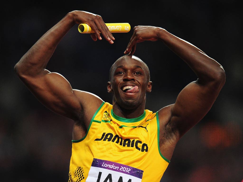 Usain Bolt celebrates gold by doing 'The Mobot'