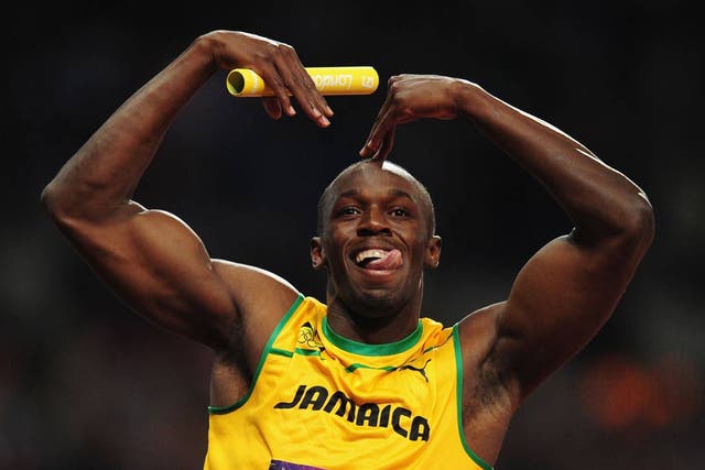 Usain Bolt celebrates gold by doing 'The Mobot'