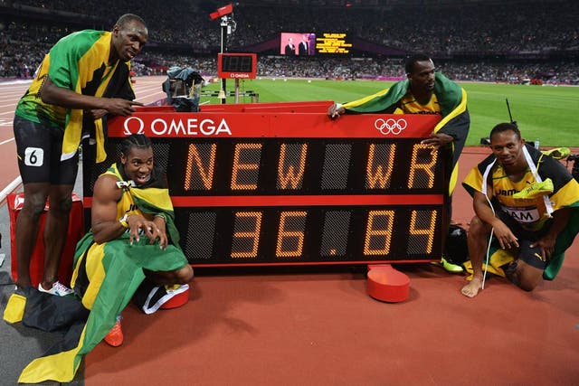 August 11, 2012: Usain Bolt and his Jamaican team-mates celebrate breaking the world record.