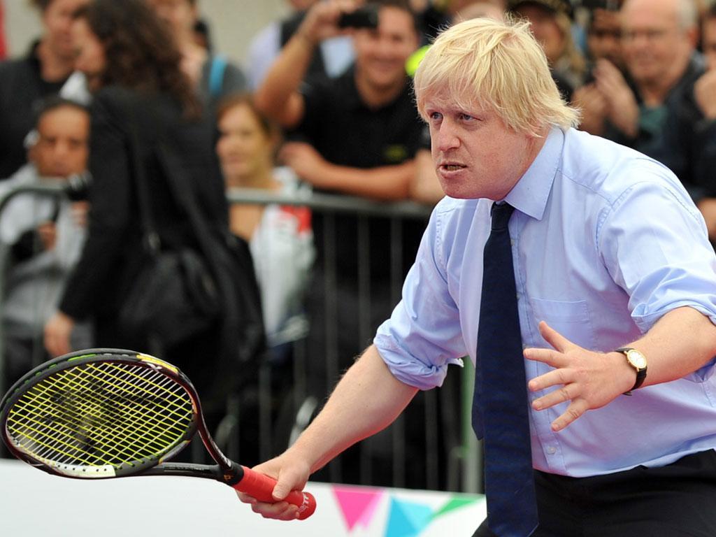 Boris Johnson playing tennis.