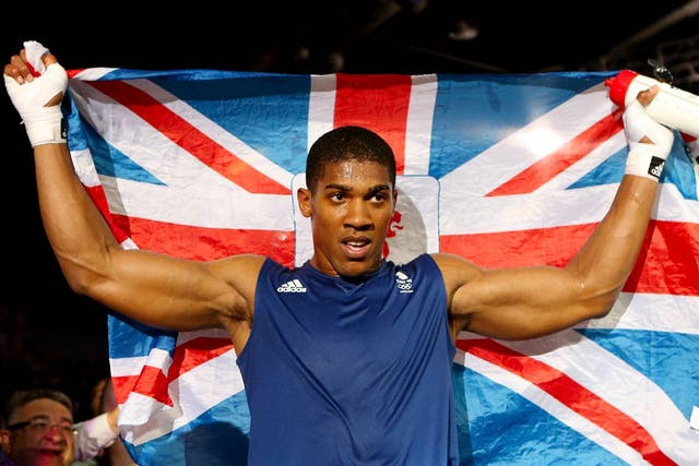 August 12, 2012: Anthony Joshua celebrates winning the gold medal