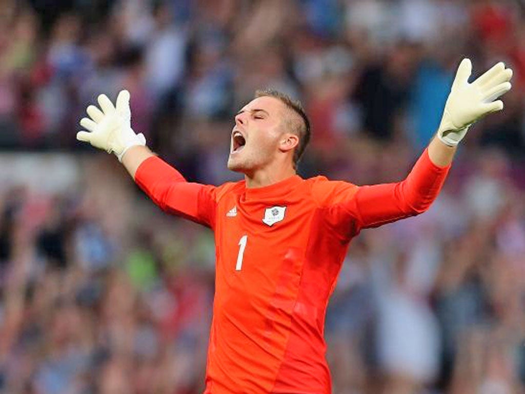 Jack Butland celebrates Team GB’s first goal of the Olympics against Senegal at Old Trafford