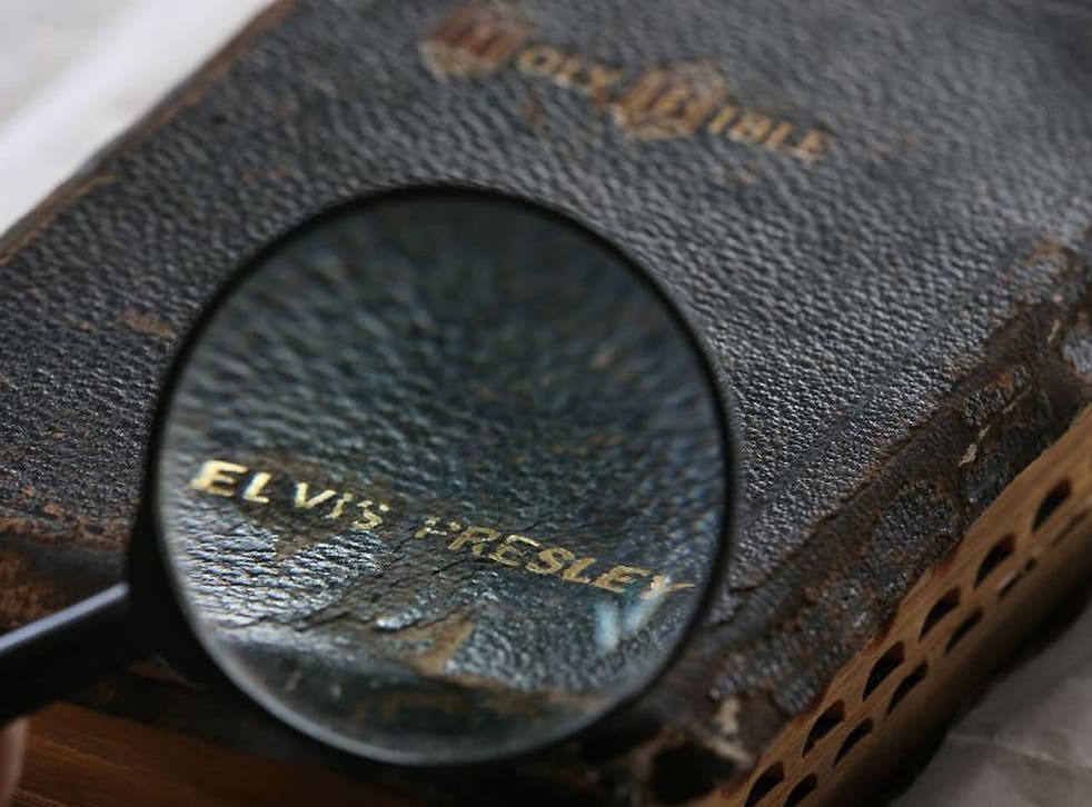 A closer look at a Bible that used to belong to Elvis Presley, at Omega Auctions in Stockport